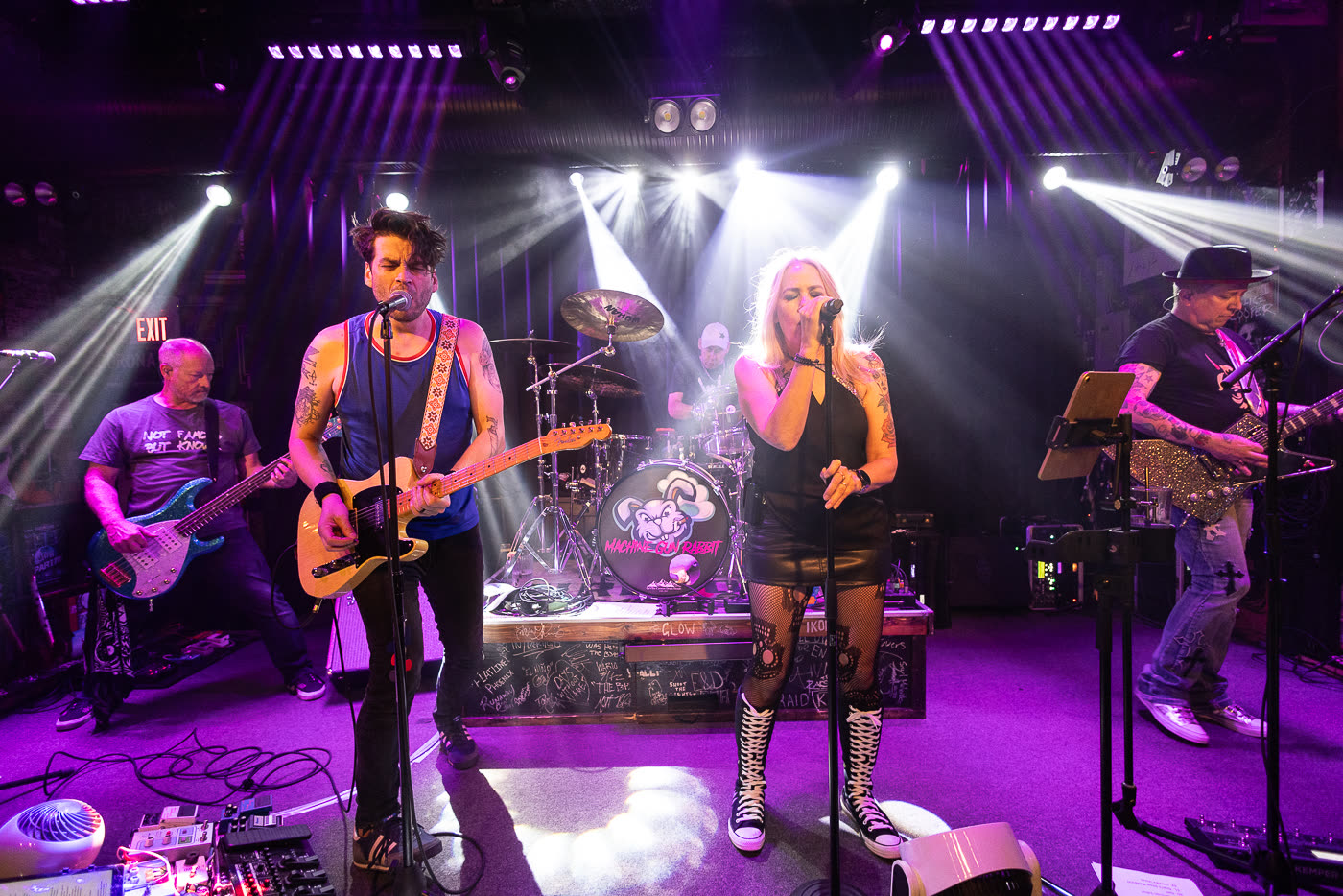 Mike and Libby singing lead with Machine Gun Rabbit on stage